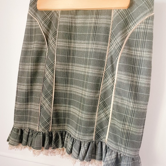 Plaid mini Bebe skirt with lace details - Picture 1 of 2